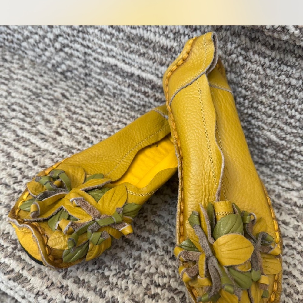Yellow and Green Mules with Intricate Cutout Design